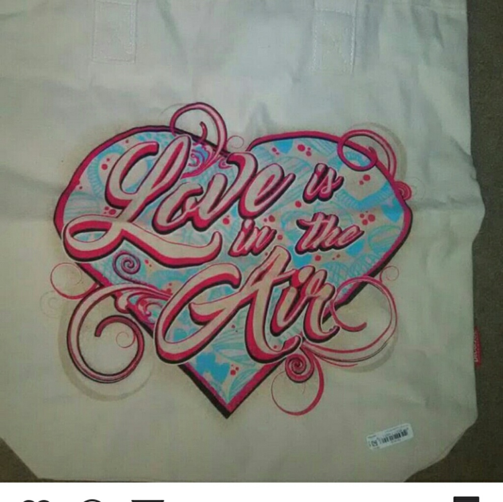 Del sol "love is in the air" tote bag.